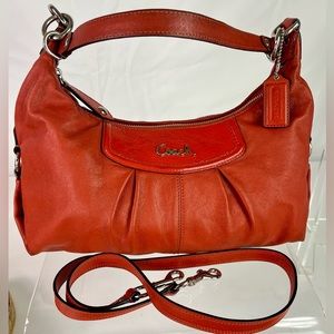 Coach leather shoulder bag with detachable crossbody strap. Burnt orange color